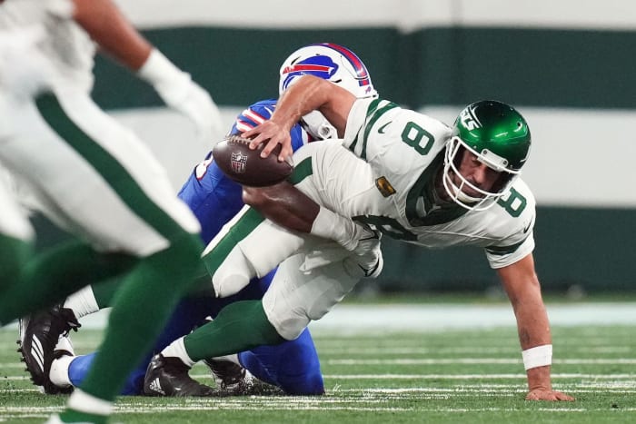 Jets' QB Aaron Rodgers is sacked by Bills' DE Leonard Floyd